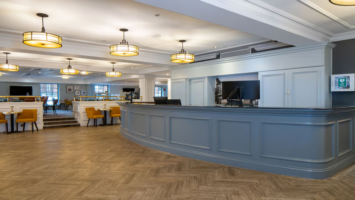 Image shows Best Western Glasgow Aryle restaurant area after LED replacements with lighting project.