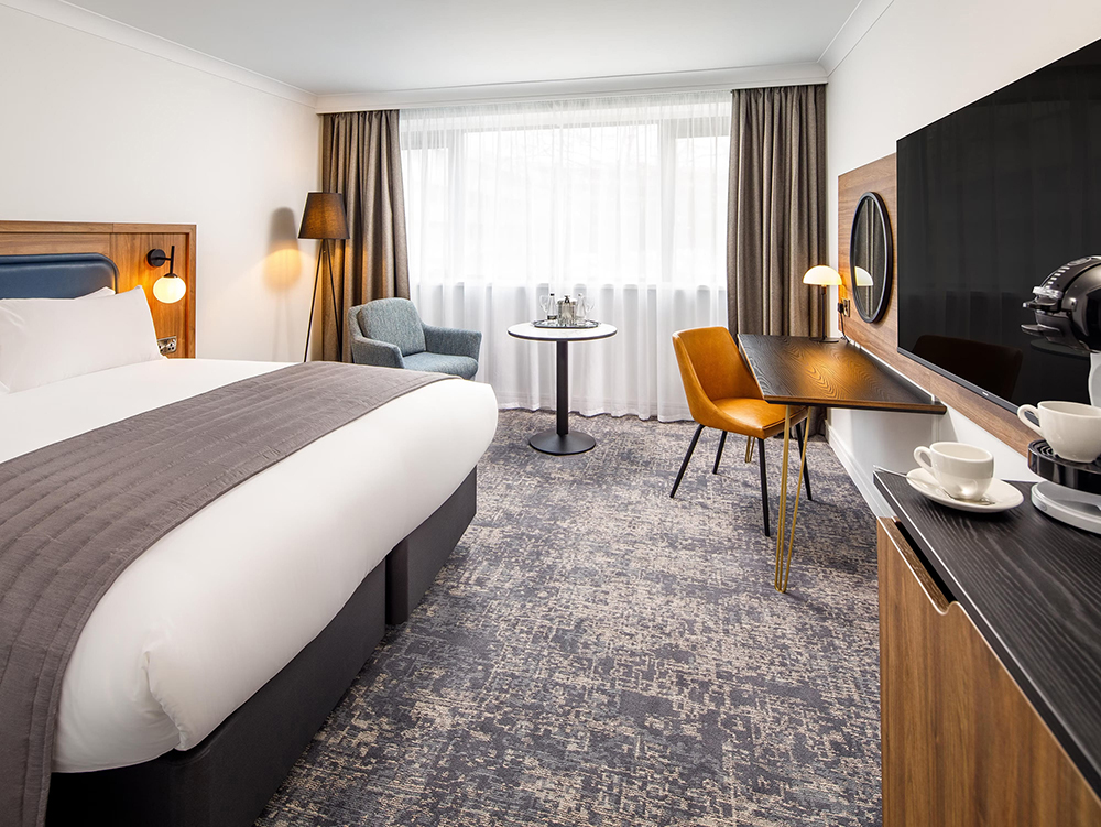 Crowne Plaza Manchester Airport guest room after completion of lighting project upgrade.