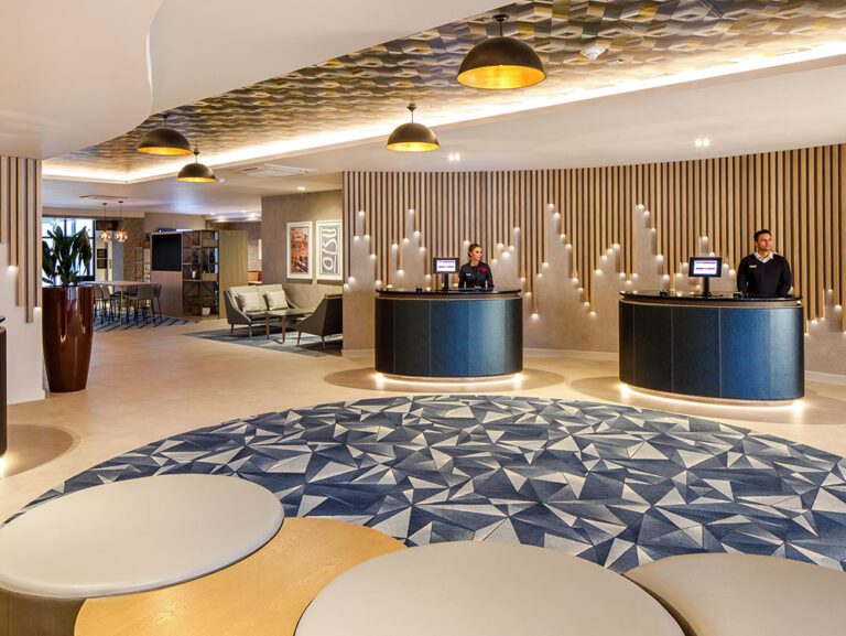 Crowne Plaza Manchester AIrport lounge area after upgrading to led lighting with lighting project.