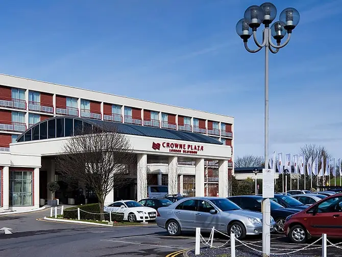 The image shows the Crowne Plaza main entrance following the lighting project.
