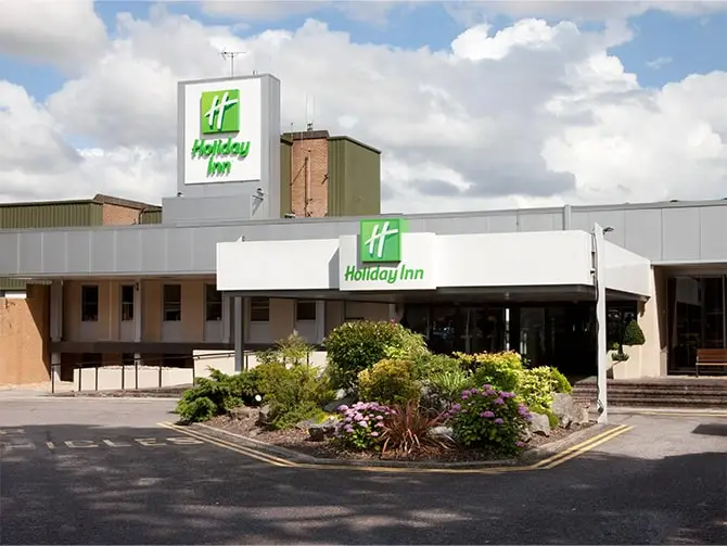The image shows the main entrance of the Holiday Inn Bristol Filton after completed lighting project.