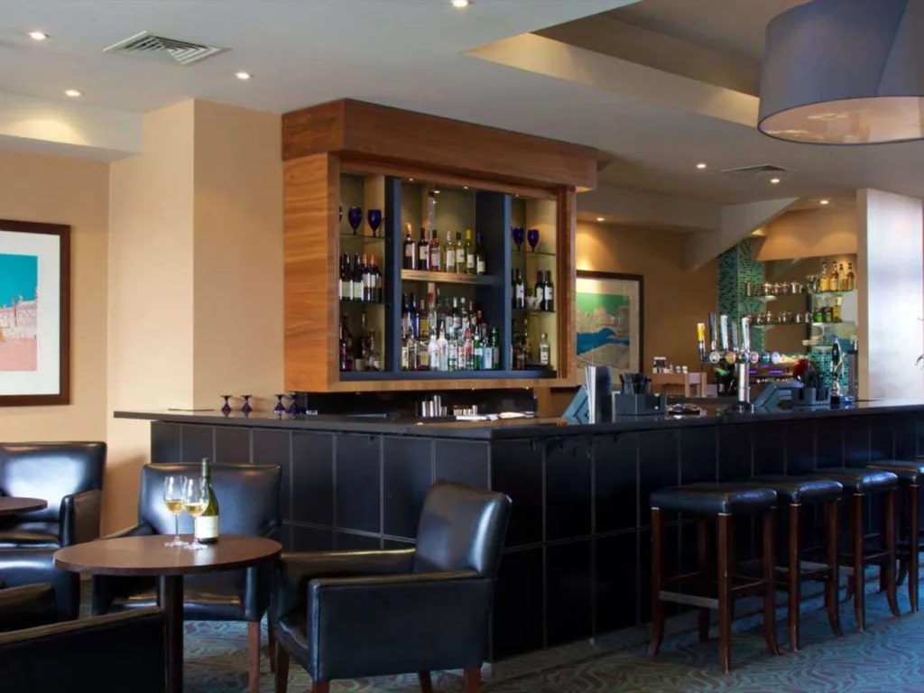 Bar area at the Bar Hill Hotel Cambrideshire after successful LED lighting upgrade by Lightsave Projects.