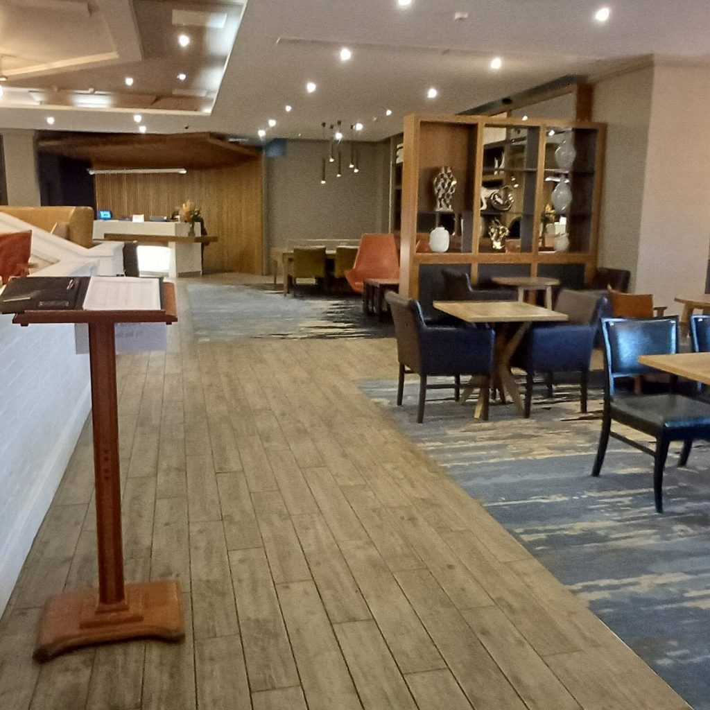 Crowne Plaza Solihull corridor after LED lighting project upgrade.