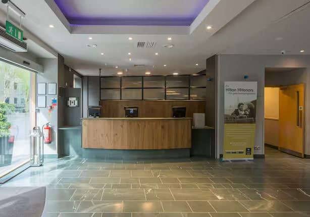Hilton Garden Inn Bristol reception area after lighting project completion.