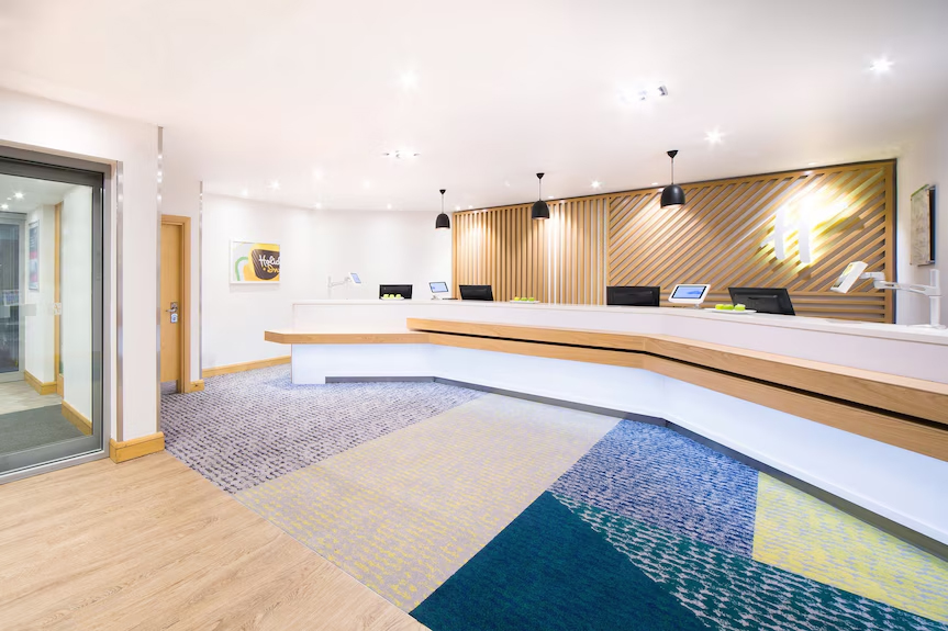 Holiday Inn Gatwick reception area after lighting project.