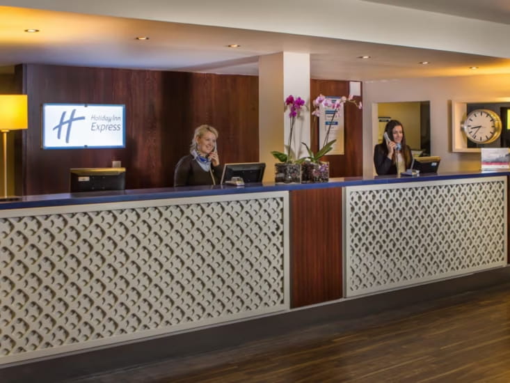 Holiday Inn Express London Docks reception area after lighting project.