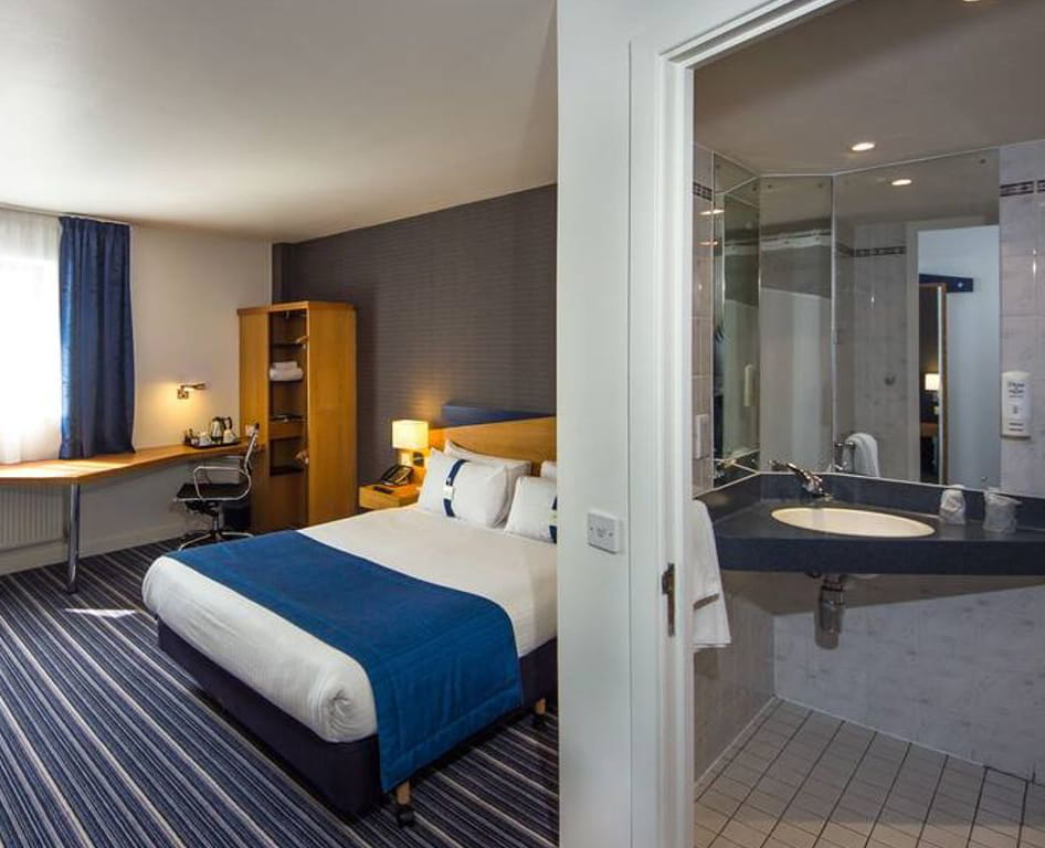 Holiday Inn Express London Royal Docks bedroom after lighting project.